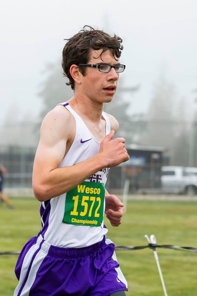 Cooper Billiter runs to 79th place  third among freshmen  at the league meet Saturday. (Photo by John Fisken)
