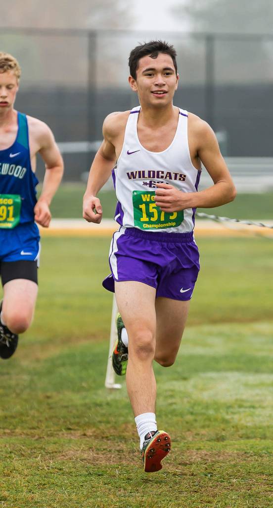 Ralph Ramier takes fourth among freshmen and 99th overall in the Wesco meet.(Photo by John Fisken)
