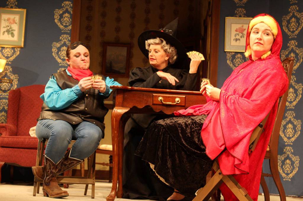 In between sisterly dramas and deliberations, actual card games do take place in The Octette Bridge Club. Playing a Halloween hand are Jamie Montoya (Lone Ranger), Ingrid Schwalbe (Good/Bad Witch) and Emily Scheidel (Little Red Riding Hood.)