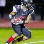Sean Toomey-Stout heads up field after scooping up a kickoff.(Photo by John Fisken)