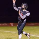 Shane Losey tosses a pass for the Wolves.(Photo by John Fisken)
