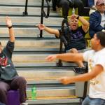 Vince Quidachay, center in black shirt, has brought the Oak Harbor student section to life this season. (Photo by John Fisken)