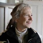 Photo by Laura Guido/Whidbey News-Times. Lynn Hyde stands inside the Haller House, a historic home that her nonprofit group recently purchased in order to preserve it.