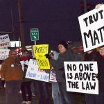 Protest over AG’s firing held in Oak Harbor Thursday