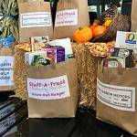 Oak Harbor Motors holds food drive for Help House