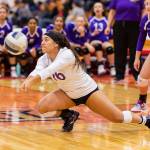 Ceirra Dean makes a diving save for Oak Harbor.(Photo by John Fisken)