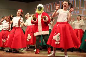 Poodle skirts swing and kids sing