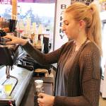 Photo by Laura Guido/Whidbey News-Times.                                Jacklyn Curtis makes a drink at Rock Island Coffee on Midway Boulevard in Oak Harbor.