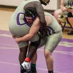 DeAndre Bennett, left, and Nate Nunez tangle during Wednesdays scrimmage. (Photo by John Fisken)