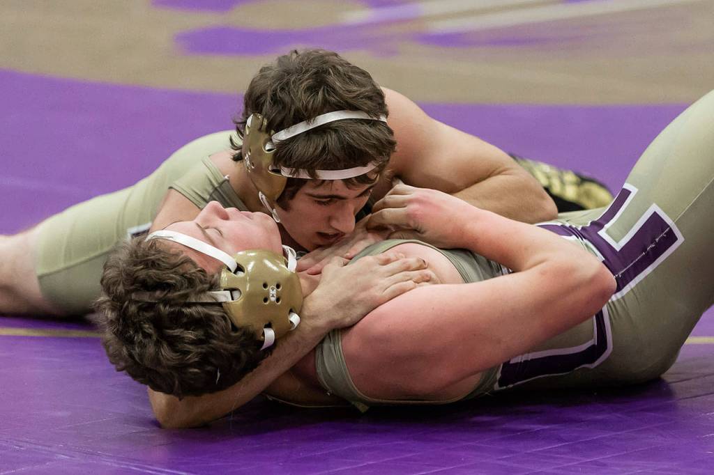 Ethan Pace has Zach English in trouble.(Photo by John Fisken)