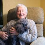 Photo by Maria Matson/Whidbey News Group.                                South Whidbey veteran Jill Johnson holds her miniature poodle, Sophie.