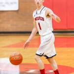 Point guard Jered Brown sets up the Coupeville offense. (Photo by John Fisken)