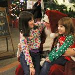 Photo by Laura Guido/ Whidbey News-Times.                                During Oak Harbors celebration on Pioneer Way Saturday, Tracy, 10, and Katelyn, 5, tell Santa Claus what they want for Christmas this year. He regrettably informed them he cannot give live animals.