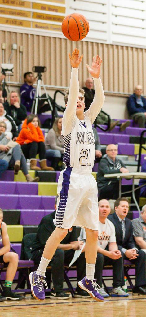 Austin Boesch launches a three-pointer Tuesday.(Photo by John Fisken)