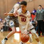 Sean Toomey-Stout blows by a Friday Harbor defender.(Photo by John Fisken)
