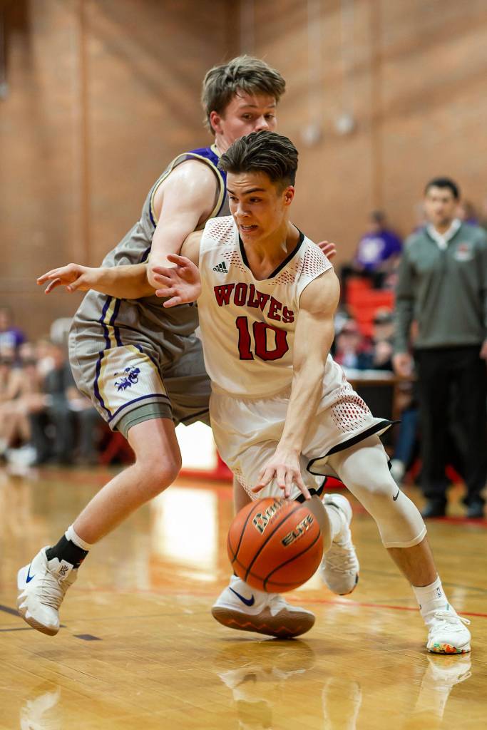 Sean Toomey-Stout blows by a Friday Harbor defender.(Photo by John Fisken)