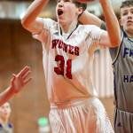 Urlik Wells powers to the hoop for the Wolves.(Photo by John Fisken)