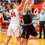 Lindsey Roberts (24) blocks Friday Harbors Piper Taylors shot.(Photo by John Fisken)