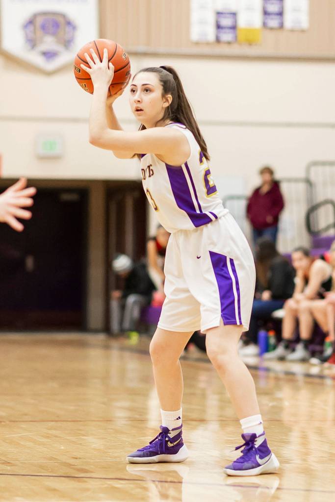 Emily Gouge looks to run the Oak Harbor offense.(Photo by John Fisken)