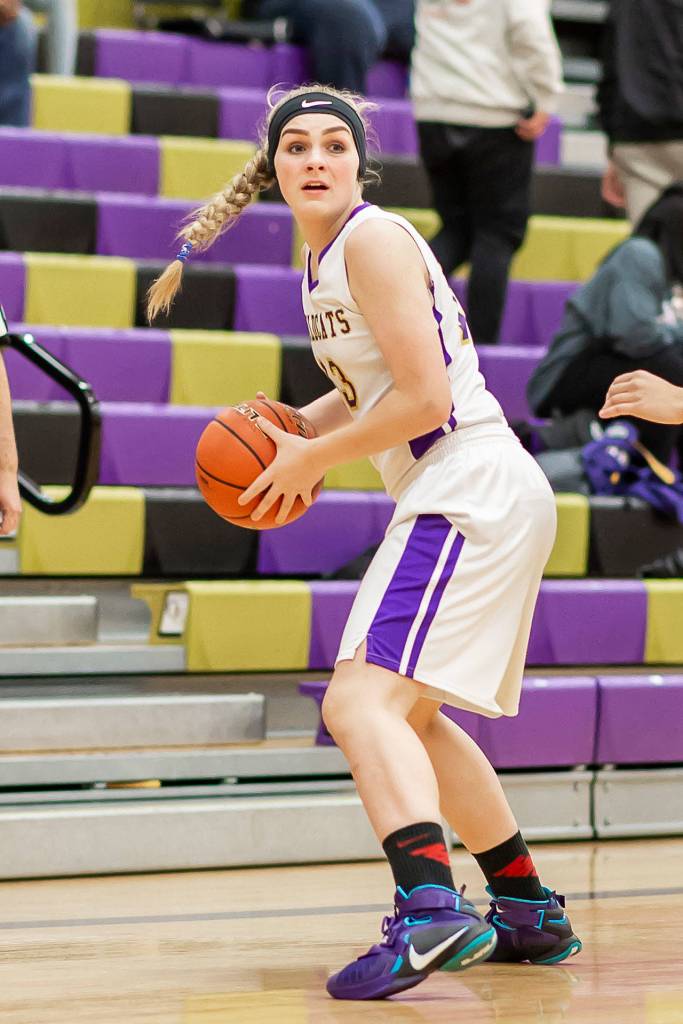 Payton Parks looks for an open teammate in Tuesdays game.(Photo by John Fisken)