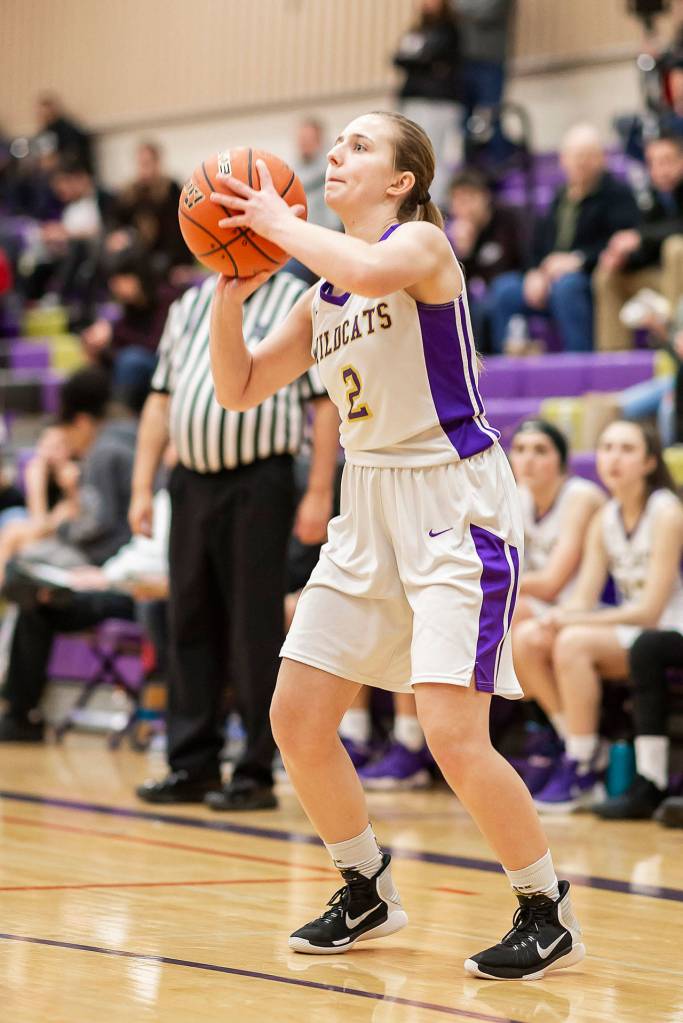 Monique Stolmeier launches a three-point shot.(Photo by John Fisken)