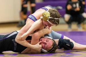 Wildcats begin dual season with double win / Boys wrestling