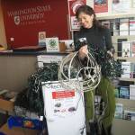<strong>Photo by Maria Matson/Whidbey News Group.</strong>                                Sarah Bergquist of Waste Wise holds a pile of cords that have been recently donated at the Coupeville WSU Waste Wise location, totaling 140 pounds.