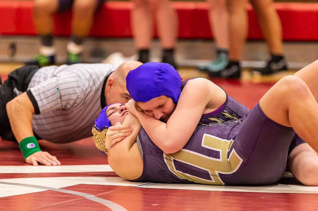 Elizabeth Clairmont has teammate Abigail Correa-Cruz in trouble in an exhibition match Wednesday. (Photo by John Fisken)