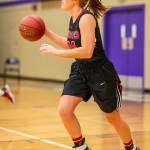 Ema Smith advances the ball for the Wolves. (Photo by John Fisken)
