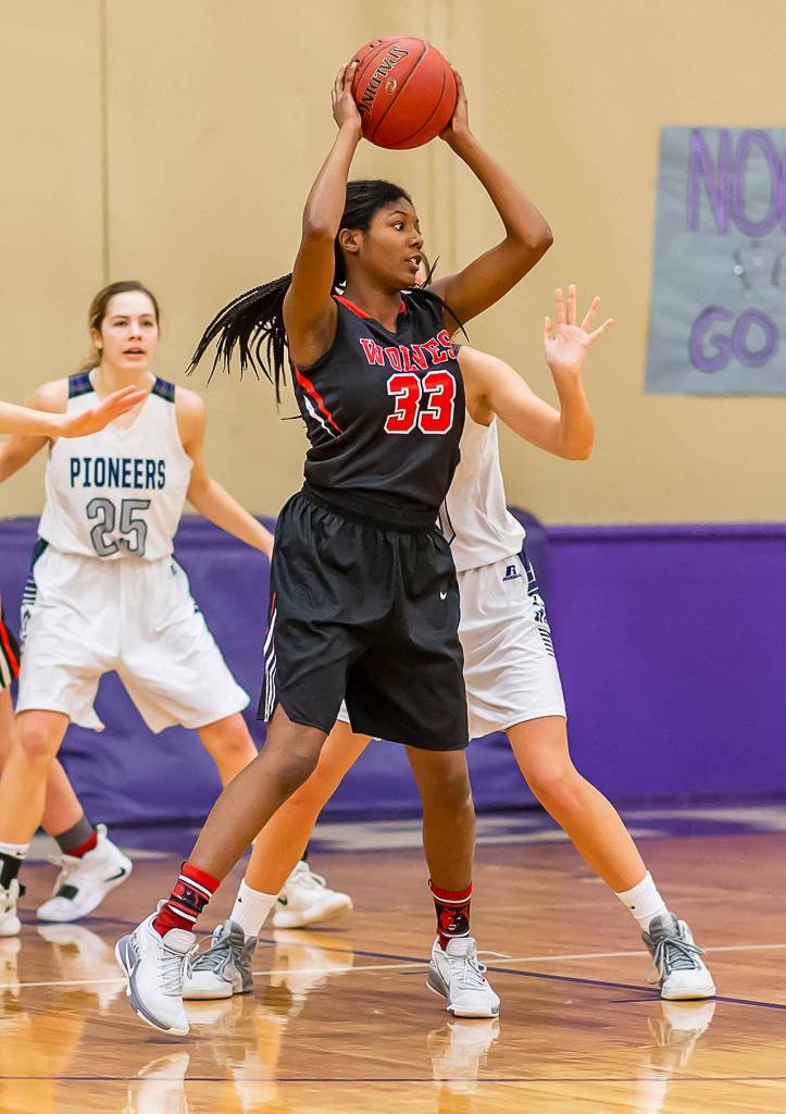 JaKenya Hoskins looks to rotate the ball in Saturdays game.(Photo by John Fisken)
