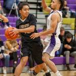 Haven Brown, right, clamps down a Lynnwood player.(Photo by John Fisken)