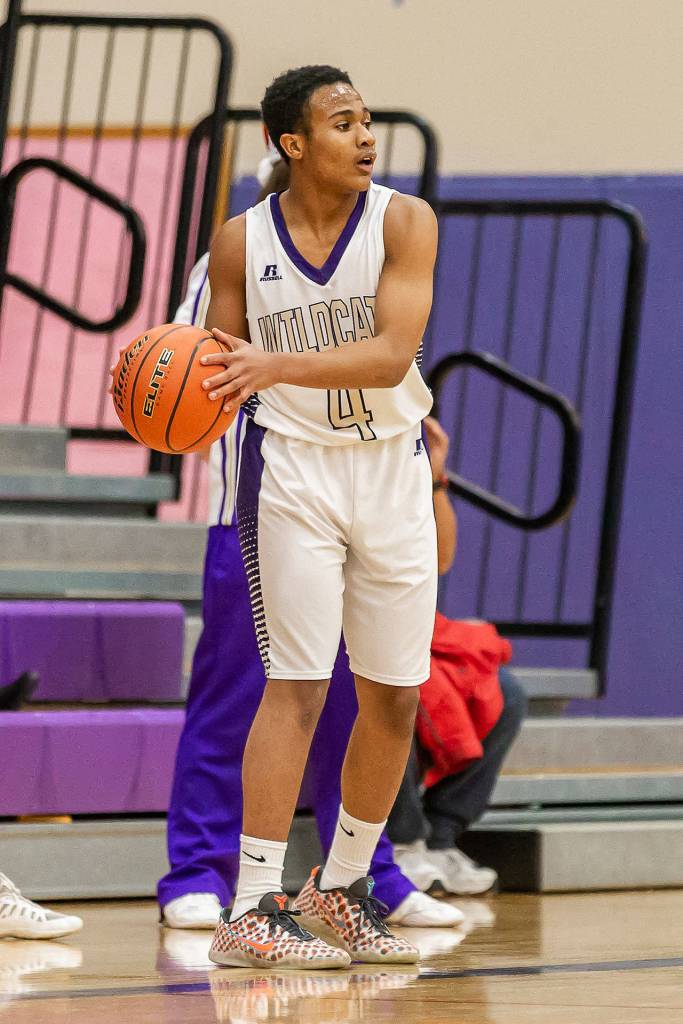 TaShaun Howard looks to inbound the ball against Lynnwood.(Photo by John Fisken)