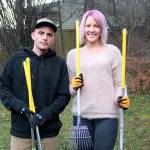 Pooper Trooper owners Conrad and Shannon Useman with their Pooper Trooper supplies. Photo by Laura Guido/Whidbey News-Times