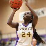 Sarah Mensah puts a shot in Oak Harbors win against Cascade.(Photo by John Fisken)