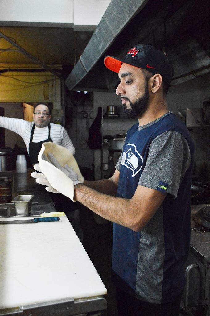 Jaskaran Singh prepares naan in the kitchen at Harbor View Tasty India. Photo by Laura Guido/Whidbey News-Times