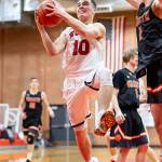 Sean Toomey-Stout takes the ball to the hole.(Photo by John Fisken)