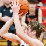 Wolves tame Tigers for 1st NSC win / Boys basketball