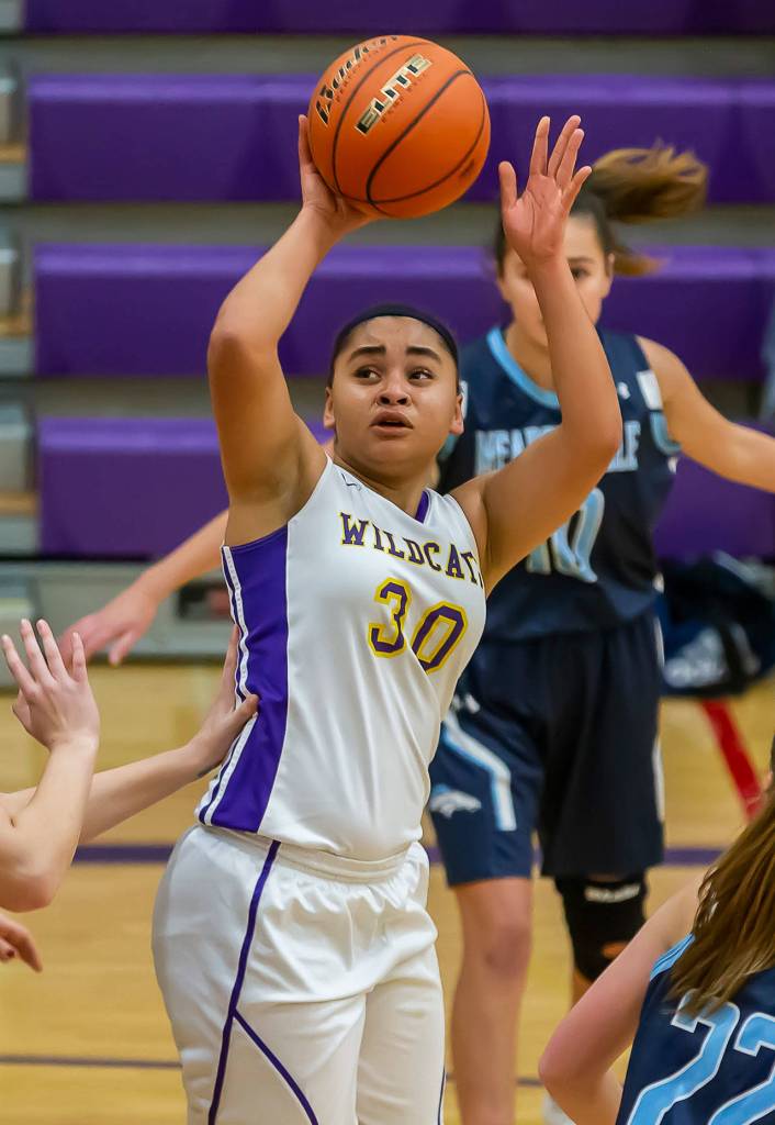 Tiana Jackson attempts to score for Oak Harbor.(Photo by John Fisken)