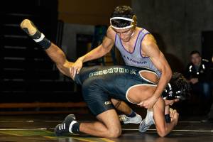 Late surge too little, Wildcats lose to Chargers / Boys wrestling