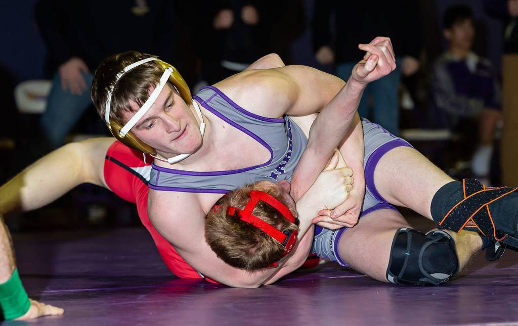 Thibault Simonata, top, records a first-round fall against Christian Squadrito of Snohomish.(Photo by John Fisken)