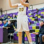 Grace Waite fires a three-point shot against Shorecrest.(Photo by John Fisken)