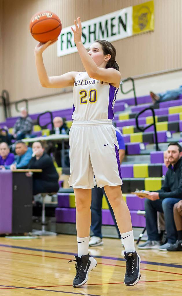 Grace Waite fires a three-point shot against Shorecrest.(Photo by John Fisken)