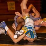 Caleb Fitzgerald, top, has Mariners Kaleb Matishak in trouble. (Photo by John Fisken)