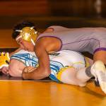 Cole Valdez, top, tries to take control in his match with Jose Zamora.(Photo by John Fisken)