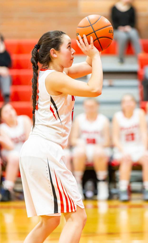 Scout Smith prepares to sink an important free throw late in the game Tuesday.(Photo by John Fisken)