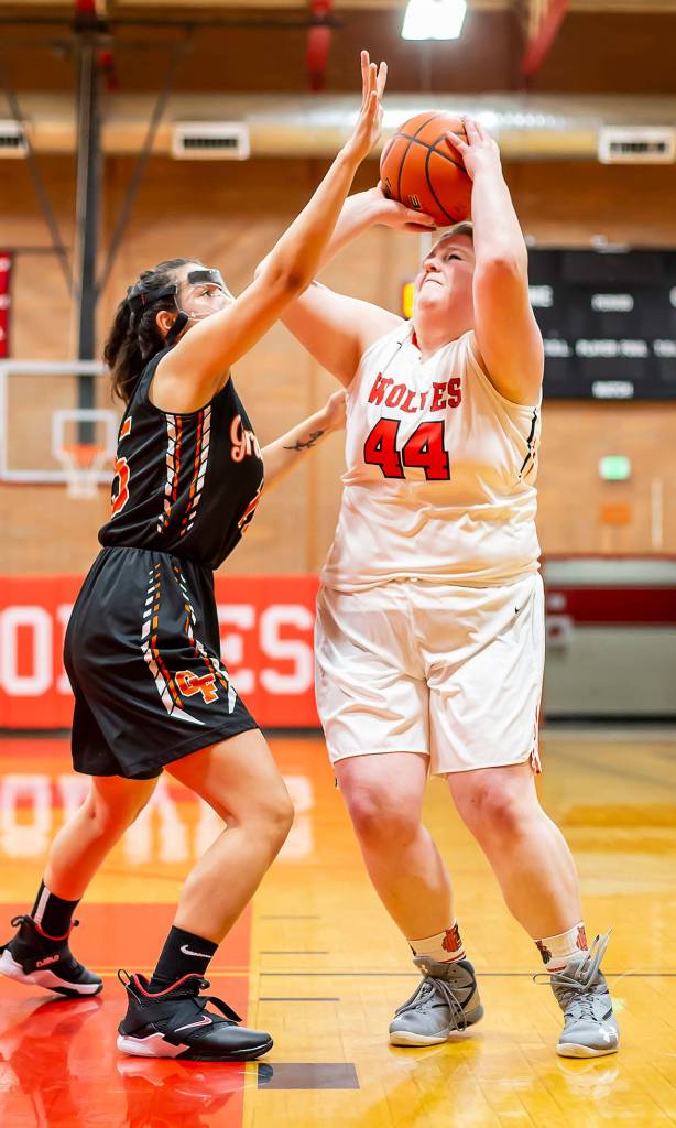 Nicole Laxton, right, looks to score for Coupeville.(Photo by John Fisken)