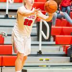 Avalon Renninger puts the ball in play with an inbounds pass.(Photo by John Fisken)