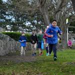 Photo by Laura Guido/Whidbey News-Times                                Felipe Ruiz powers through the final stretch of the loop outside Oak Harbor Elementary School.