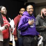 Unity Choir members Wismine Davilar, far left, Tyrone Vester, center front, Josh Jackson, center back, and Jarrod Stafford rehearse Thursday night for the annual Martin Luther King Jr. service, which is set for 3 p.m. Sunday at House of Prayer in Oak Harbor. Photo by Laura Guido/Whidbey News-Times