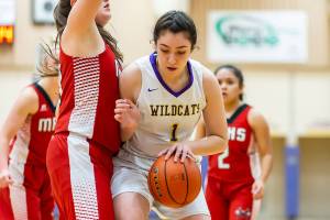 M-P holds off Oak Harbor comeback / Girls basketball